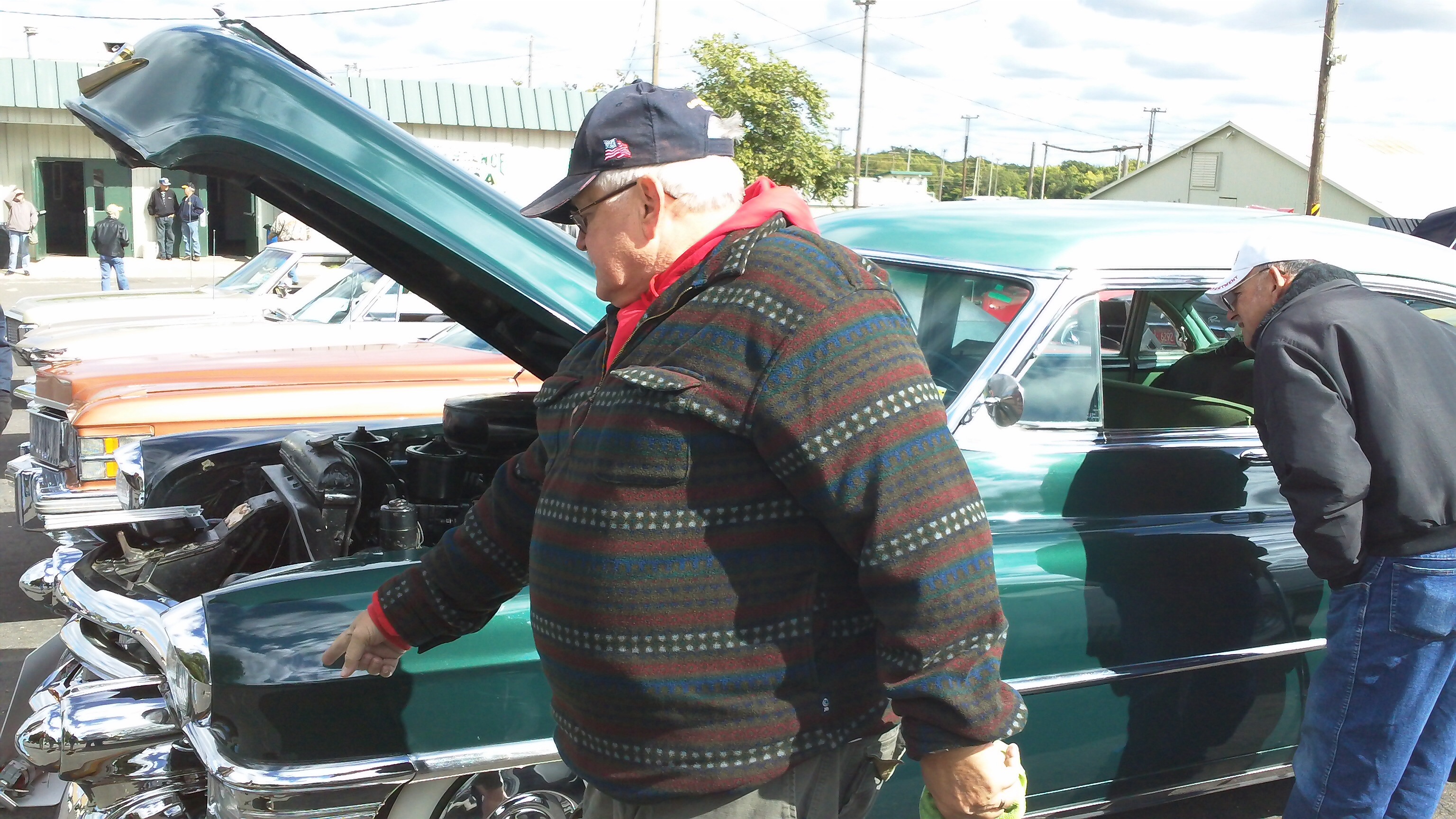 Fred is always happy to show off the features of Dad's Cadillac 